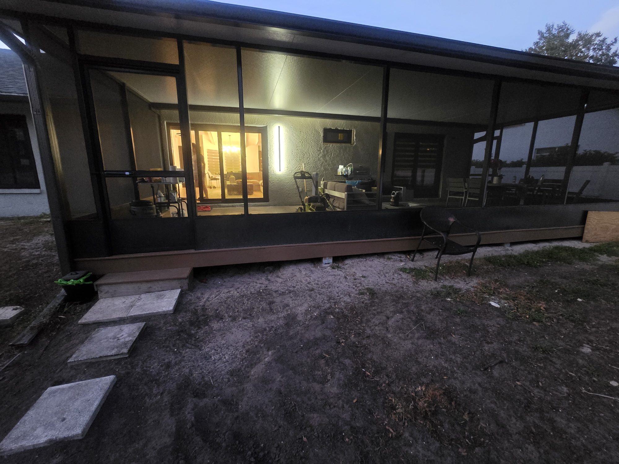 Existing screened porch at dusk